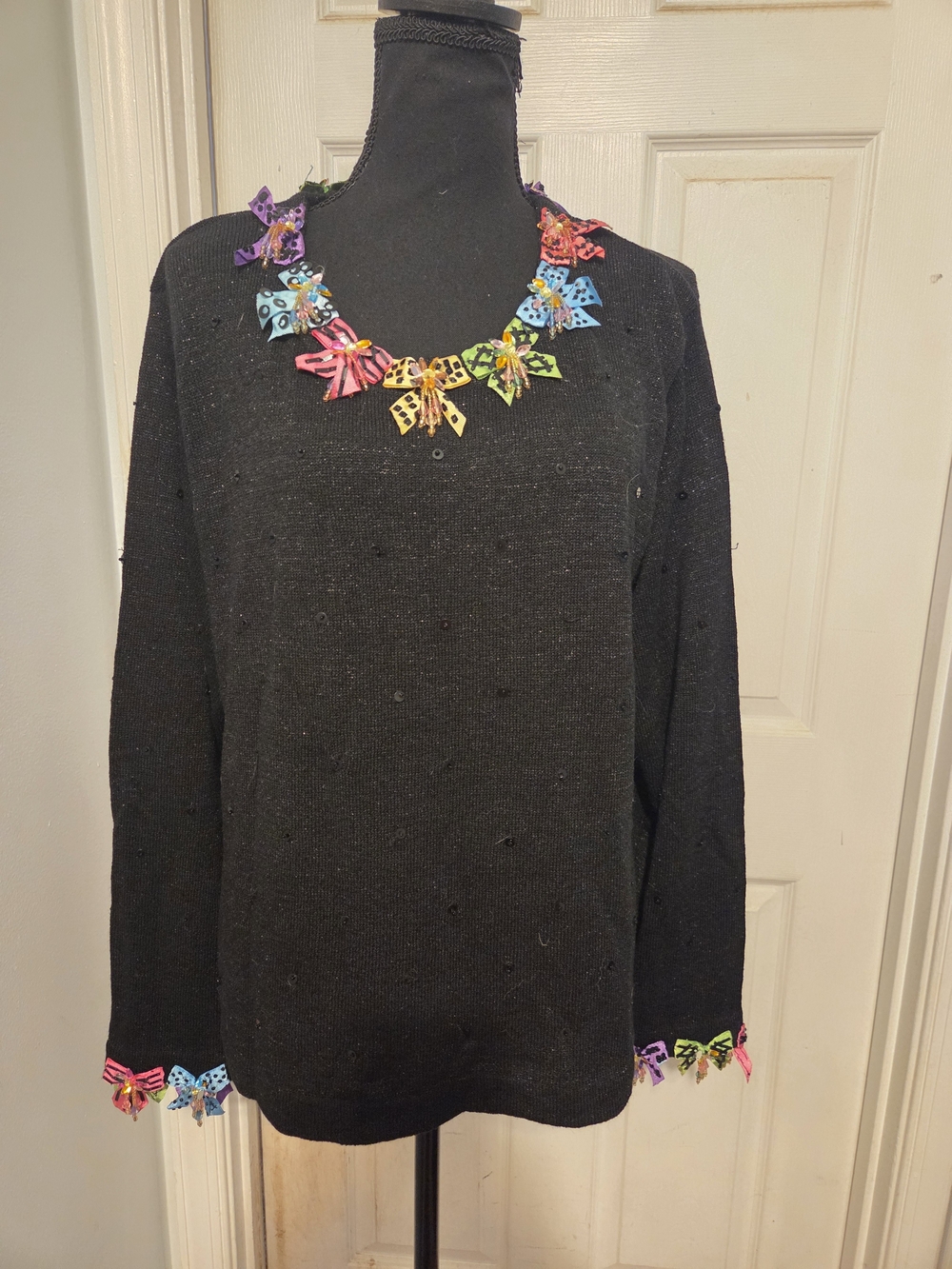 Black Crew Neck Sweater with Colorful Bow Accents